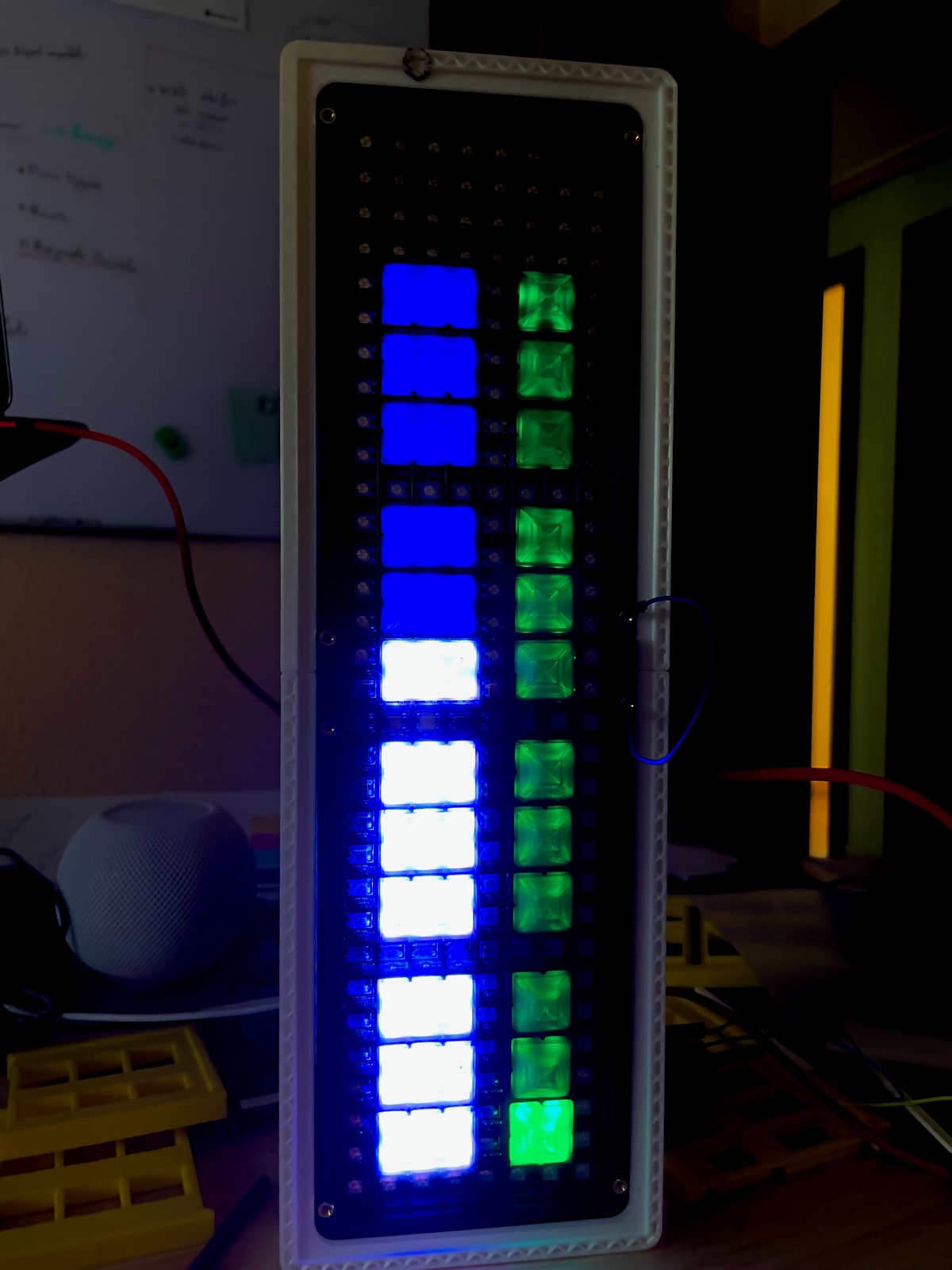 The 2022 hardware prototype standing on a desk, block columns glowing